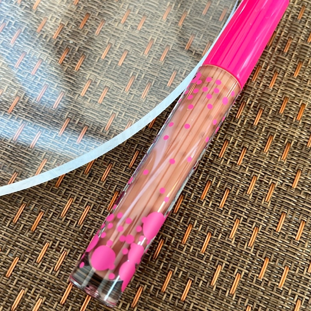 Coloured Raine lip lacquer in veronica